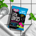 Pack of Caring Candies Little Lovies on a white tiled background with mint leaves.