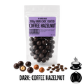 Packaged  no added sugar dark chocolate-coated coffee hazelnuts with a clear bag and visible label on a clear background.