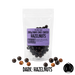 Packaging of  no added sugar dark chocolate-coated hazelnuts with a purple label on a white background.