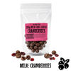 Packaged no added sugar milk chocolate coated cranberries with a pink label on a white background