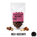 Packaged no added sugar milk chocolate-coated hazelnuts with a pink label on a white background