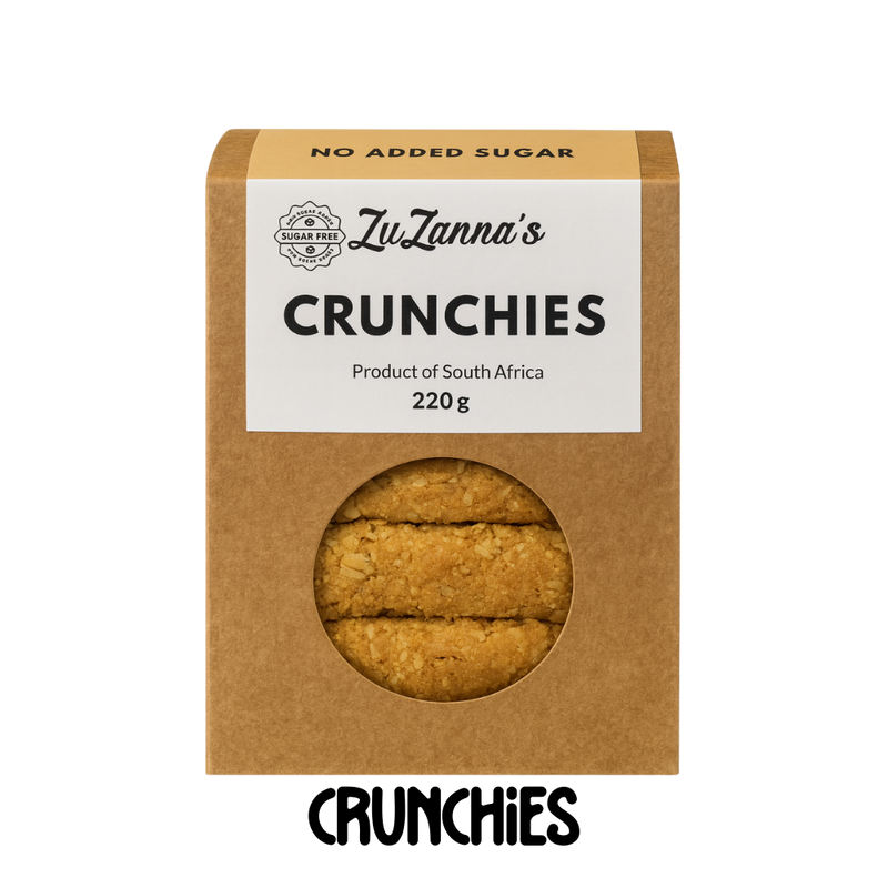 Box of ZuZanna's Sugarfree Crunchies with a clear window showing the cookies inside on a clear background.