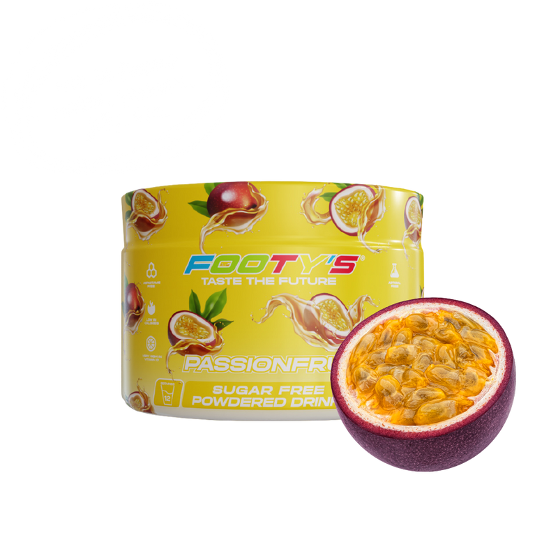 A yellow tub of Footys Passionfruit Sugar Free Powdered Drink mix next to a fresh halved passionfruit on a white background.