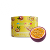 A yellow tub of Footys Passionfruit Sugar Free Powdered Drink mix next to a fresh halved passionfruit on a white background.