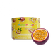 A yellow tub of Footys Passionfruit Sugar Free Powdered Drink mix next to a fresh halved passionfruit on a white background.