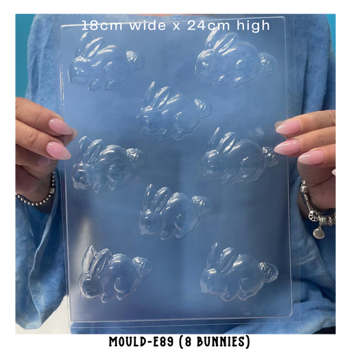 Clear reusable easter chocolate or soap mould of a few small bunnies