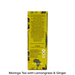 A tall yellow tea box shown from the back on a white background, with black text describing the tea blend and storage instructions. The box has green and black botanical illustrations and a SuperFungal logo near the bottom.