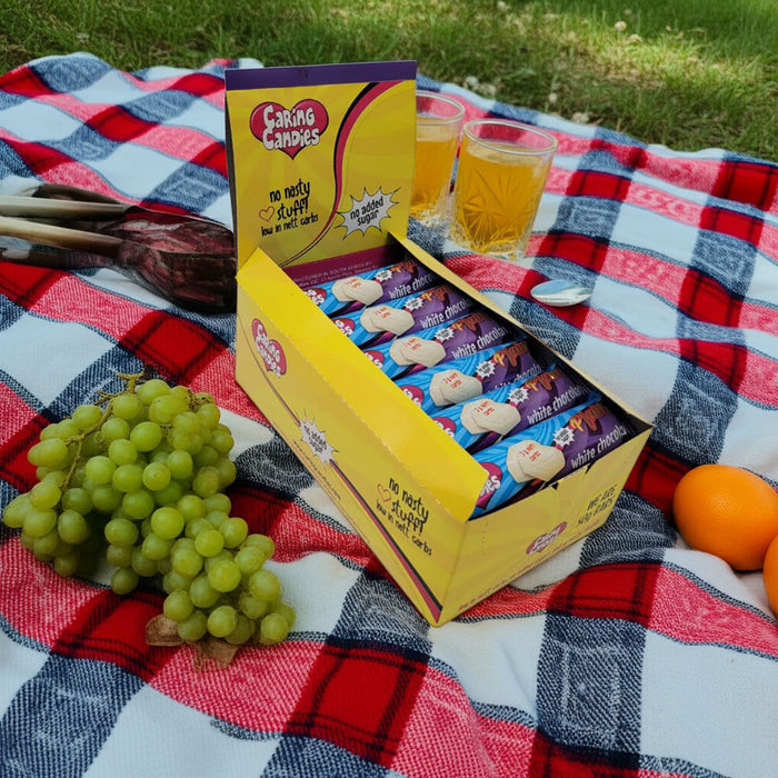 A retail display box of 30x50g caring candies sugar-free premium white chocolate bars
