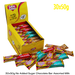 Box of Caring Candies with assorted milk chocolate bars on a white background