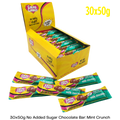 Box of Caring Candies milk chocolate bars with mint crunch, featuring a yellow box and colorful packaging.