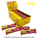 Box of Caring Candies milk chocolate bars, featuring a yellow box and colorful packaging.