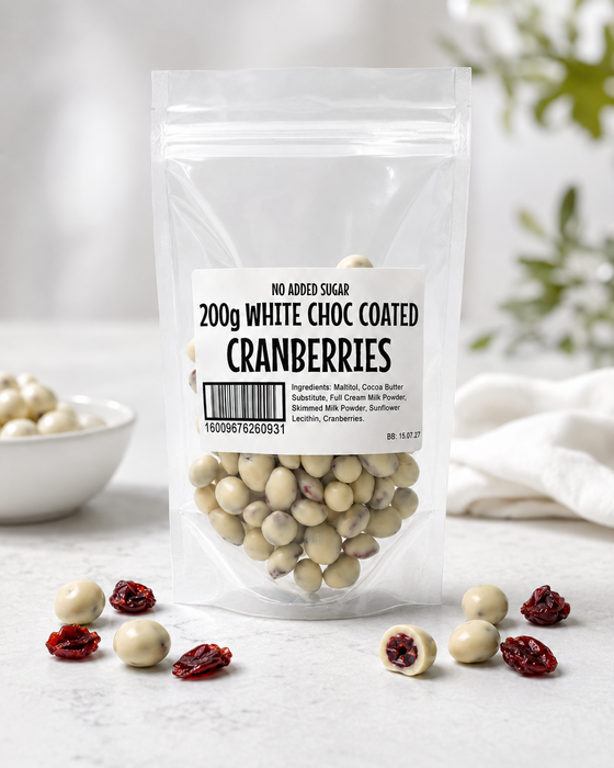 Bag of  no added sugar white chocolate coated cranberries with a label on a light background