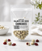 Bag of  no added sugar white chocolate coated cranberries with a label on a light background