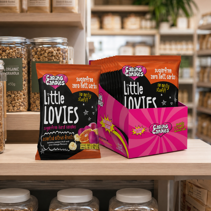 Caring Candies Sugarfree assorted citrus Flavoured Little Lovies Sweets packaging on a store checkout counter 