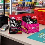 Caring Candies Sugarfree Liquorice flavoured Little Lovies Sweets packaging on a store checkout counter 