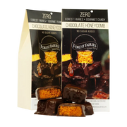 Two packages of Forest Fairies Zero sugarfree dark Chocolate Honeycomb on a clear background