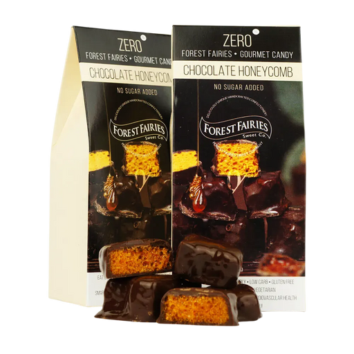 Two packages of Forest Fairies Zero sugarfree dark Chocolate Honeycomb on a clear background