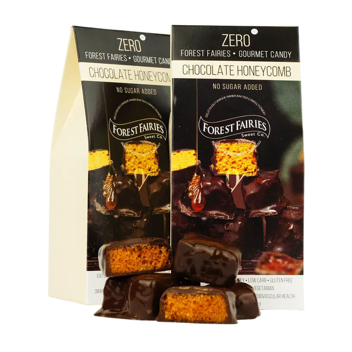 Two packages of Forest Fairies Zero sugarfree dark Chocolate Honeycomb on a clear background