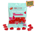 Packet of gloot sugarfree flat tummy heart shaped gummies with red heart gummies scattered around the bottom 
