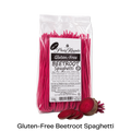 Packet of Glutenfree Pasta Regalo beetroot spaghetti with uncooked beetroot in front of it