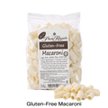 Packet of Glutenfree Pasta Regalo macaroni with uncooked macaroni in front of it