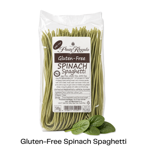 Packet of Glutenfree Pasta Regalo spinach spaghetti with spinach leaves in front of it
