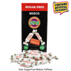 Star Sugarfree Mebos Toffees in a black and red box with several individually wrapped toffees displayed in front, plus a yellow warning badge stating it contains artificial colours.