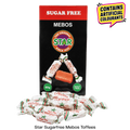 Star Sugarfree Mebos Toffees in a black and red box with several individually wrapped toffees displayed in front, plus a yellow warning badge stating it contains artificial colours.