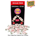 A bag of Star Sugar Free Original Pink Toffees with several individually wrapped pink taffees scattered in front on a white background. A red banner at the top of the bag reads 'SUGAR FREE', and a yellow speech bubble in the upper right says 'CONTAINS ARTIFICIAL COLOURANTS'.