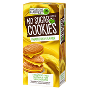 Box of Wholesome Harvest No Added Sugar Pineapple Cream Cookies showing golden sandwich cookies with yellow pineapple cream filling.