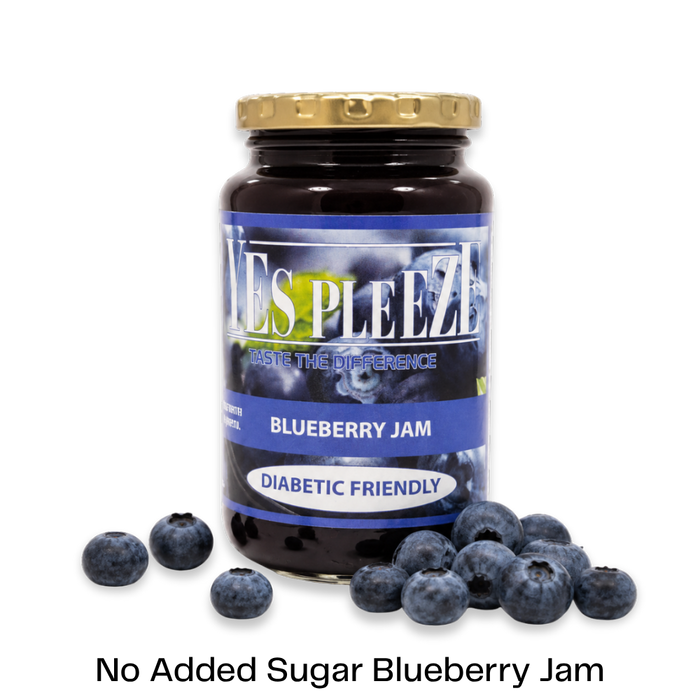 Bottle of Yes Pleeze No Added Sugar Blueberry Jam with fresh blueberries scattered around the bottom